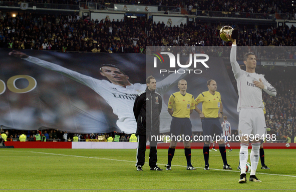 SPAIN, Madrid:Real Madrid's Portuguese forward Cristiano Ronaldo shows his fans the golden ball before starting the Spanish Kings´cup 2014/1...