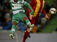 Sporting's midfielder Nani (L)  challenges Rio Ave's defender Lionn during the Portuguese League football match between Sporting CP and Rio...