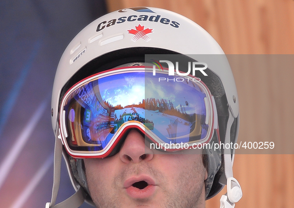 Marc-Antoine Gagnan (Bronze Medal) watches his Canada Team mates, Mikael Kingsbury and Philippe Marquis, racing for  GOld Medal, in Dual Mod...