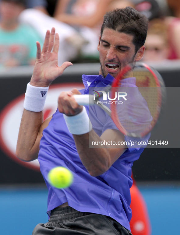 (150120) -- MELBOURNE, Jan. 20, 2015 () -- Brazil's Thomaz Bellucci returns the ball during his men's singles first round match against Spai...