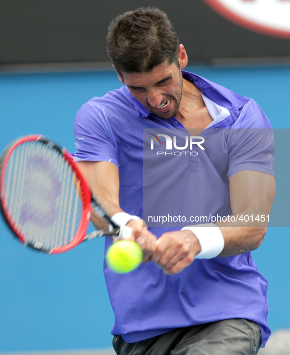 (150120) -- MELBOURNE, Jan. 20, 2015 () -- Brazil's Thomaz Bellucci returns the ball during his men's singles first round match against Spai...