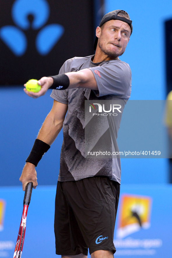 (150120) -- MELBOURNE, Jan. 20, 2015 () -- Australia's Lleyton Hewitt serves the ball during his men's singles first round match against Chi...