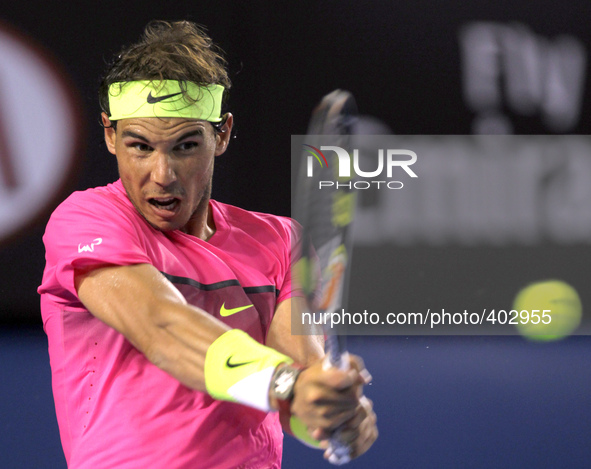 MELBOURNE, Jan. 21, 2015 () -- Spain's Rafael Nadal returns the ball during his men's singles second round match against Tim Smyczek of the...