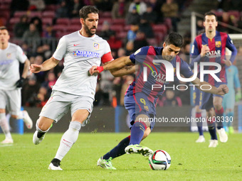 BARCELONA -21 january- SPAIN: Luis Suarez and Raul Garcia in the match between FC Barcelona and Atletico Madrid, for the first leg of the qu...