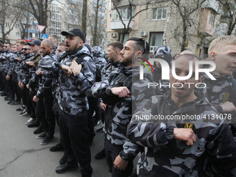 National Corps activists, the Ukrainian far-right party, attend their anti-corruption rally near the Prosecutor General's Office in Kiev, Uk...