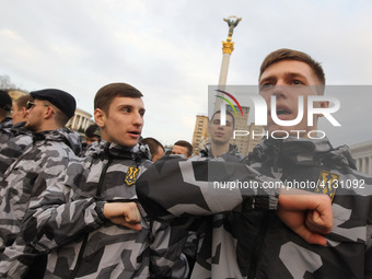 National Corps activists, the Ukrainian far-right party, attend their anti-corruption rally on the Independence Square in Kiev, Ukraine, 09...
