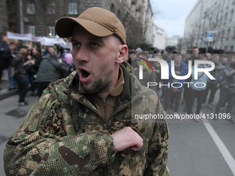 National Corps activists, the Ukrainian far-right party, attend their anti-corruption rally near the Administration of the President Petro P...