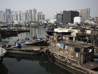 Wooden fishing boat are moor in Shekou harbour in Nanshan district, Shenzhen on January 30, 2015. Shenzhen used to be a fisherman village an...