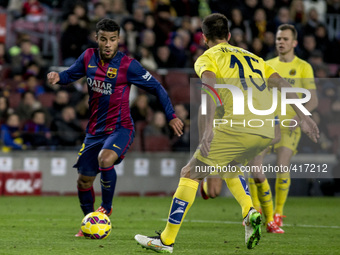 Barcelona, Catalonia, Spain. Fabruary 1, 2015 Rafinha of Barcelona and VIctor Ruiz of Villarreal in action during the spanish league match b...