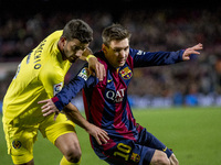 Barcelona, Catalonia, Spain. Fabruary 1, 2015 Leo Messi of Barcelona and Musacchio of Villarreal in action during the spanish league match b...