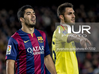 Barcelona, Catalonia, Spain. Fabruary 1, 2015 Luis Suarez of Barcelona and Victor Ruiz of Villarreal in action during the spanish league mat...