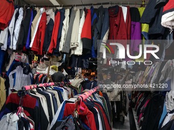 JAKARTA, INDONESIA - February 04 :  People buys a secondhand clothes at Senen Market in Jakarta, Indonesia, on February 04, 2015. Indonesian...
