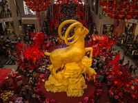 Goat sculpture decorate the lobby of a shopping mall as attraction for the upcoming Chinese New Year in Kuala Lumpur, Malaysia 07 February 2...