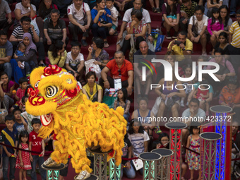Chinese traditional lion dance is perform at a shopping mall as attraction for the upcoming Chinese New Year in Kuala Lumpur, Malaysia 07 Fe...