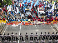 Jakarta, 01 May 2019 : Police blockade and labors. Thousands of Labor filled Merdeka Barat Street Jakarta celebrating May Day. They demandin...