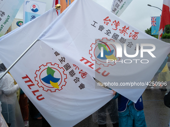 Flags belonging from the syndicate worker group from  Taiwan Tobacco and Liquor Corp During 2019 Labor Day March 6,000 workers took the stre...