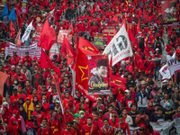 Indonesian workers take part in a May Day rally in Jakarta on May 1, 2019.  Thousands of Indonesian workers are urging the government to rai...