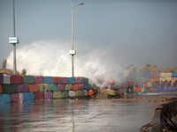 Large waves from rough seas collide with the break wall at the Gaza seaport in Gaza City on February 12, 2015 , during a winter storm. (