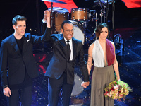 Giovanni Caccamo, Carlo Conti and Serena Brancale attends the thirth night of 65th Festival di Sanremo 2015 at Teatro Ariston on February 12...