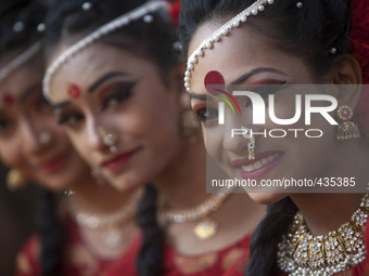 Bangladeshi women perform a traditional dance during the 