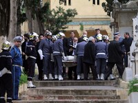 Rabbi pray over the body of French actor Roger Hanin during his funeral in the Jewish cemetery of St. Eugene Algerian capital Algiers Februa...