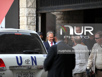 Middle East Quartet envoy Tony Blair (C) leaves after a meeting with Palestinian unity government ministers in Gaza city on February 15, 201...