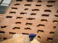 New isolation material is being installed in a house on February 16, 2015 in Voorschoten, Netherlands. In January home owners received a let...