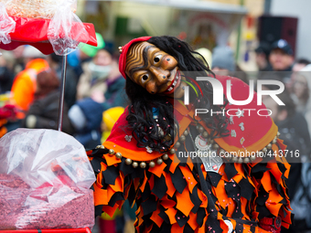 A participant with traditional mask and costume during the Rose Monday carnival parade on February 16, 2015 in Freiburg Germany.  (