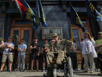 Foreign military volunteer to Ukrainian Army has a speech during a rally at Presidential Administration in Kyiv, Ukraine, June 4, 2019. Vete...