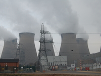Steam rising out of cooling towers at Ferrybridge Power Station, on Sunday 15th February 2015, as the power station creates electricity for...