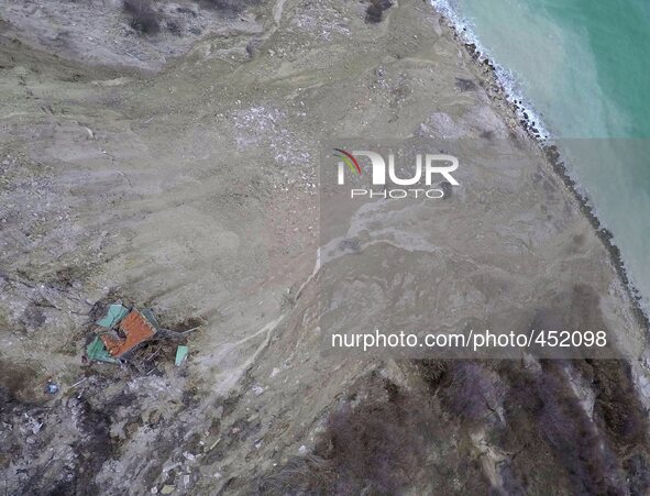 An aerial view picture taken via drone shows destroyed homes by landslide as another more than hundreds houses are in danger as an the linds...