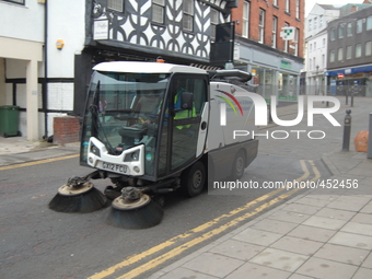 A vehicle, cleaning a street in central Stockport, on Sunday 22nd February 2015. -- The prevention of litter is a public policy response, wh...