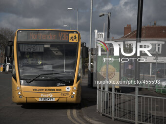 A hybrid engine school bus waiting for its next service in Manchester, Tuesday 24th February 2015. (