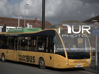 A hybrid engine school bus waiting for its next service in Manchester, Tuesday 24th February 2015. (