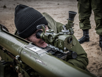 Cadet learns how to navigate SPG recoilless gun during firing training with SPG recoilless guns and Kalashnikov guns at the 169th Training c...