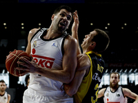 Real Madrid's Spanish player Felipe Reyes and Iberostar Tenerife´s American player Levi Ryan Rost during the Liga Endesa Basket 2014/15 matc...