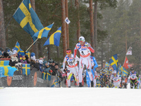 (L-R) Norway's Petter Jr Northug (4) and Canada's Ivan Babikov (20) lead Men 50km Mass Start Classic  at FIS Nordic World Ski Championship 2...