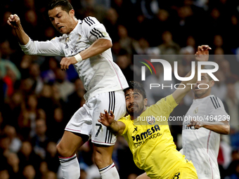 Real Madrid's Portuguese forward Cristiano Ronaldo and Villarreal CF´s Spanish Defender player Jaume Costa  during the Spanish League 2014/1...