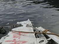 Wreckage of Air Asia QZ8501 that brought by indonesian search and rescue 'onyx' boat was hand overed to Indonesia Safety Transportation Depa...