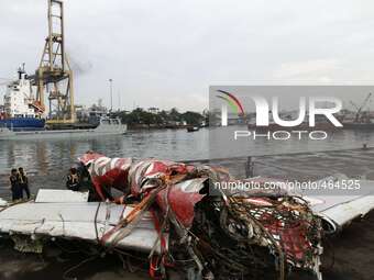 The fuselage of AirAsia QZ8501 on a vessel at the Tanjung Priok port in Jakarta on March 2, 2015. Indonesia has retrieved the final major pa...