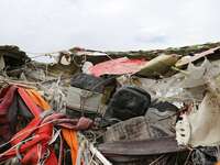 The fuselage of AirAsia QZ8501 on a vessel at the Tanjung Priok port in Jakarta on March 2, 2015. Indonesia has retrieved the final major pa...