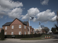 Morris Homes flags waving in the breeze at the new housing estate in Northwich, Cheshire, England, on Tuesday 3rd March 2015. -- A new housi...