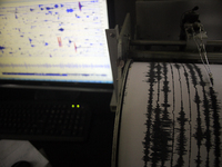 An image stored on March 7, 2015 shows a seismograph record of volcanic activity of Mount Sinabung in the observation center in Karo, Sumatr...