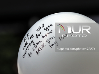 A message is written on a ballon for the missing Malaysian Airlines MH370 during the Day of Remembrance for MH370 in Kuala Lumpur, Malaysia...
