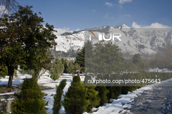 SRINAGAR, KASHMIR, INDIA - MARCH 10: A view of snow capped Zabarvan mountains on March 10, 2015 in Srinagar, the summer capital of Indian ad...