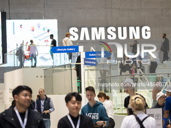 Visitors at the Samsung boot during the international electronics and innovation fair IFA in Berlin on September 11, 2019. (