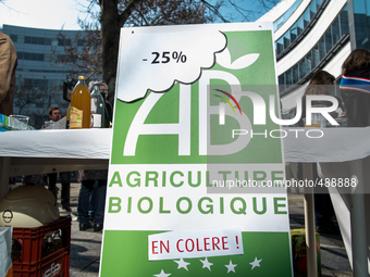 A gathering took place on March 17, 2015 in Paris to support the organic farmer and protest against the cut of 25 per cent cut from the stat...