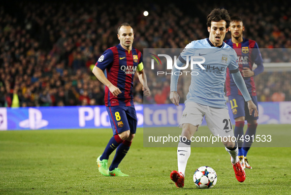 BARCELONA, SPAIN - MARCH 18: David Silva and Andres Iniesta  during the UEFA Champions League round of 16 match between FC Barcelona and Man...