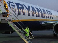 Gdansk, Poland 19th, March 2015 Lech Walesa Airport in Gdansk. 3.5 million Ryanair passenger on Gdansk airport celebration. Lady living in G...