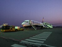 Gdansk, Poland 19th, March 2015 Lech Walesa Airport in Gdansk. 3.5 million Ryanair passenger on Gdansk airport celebration. Lady living in G...